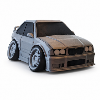 Silver BMW E36 M3 tooned 3D printed desk model shown from the front three-quarter view on a white background.