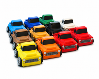 Classic Pickup Tooned 3D Printed Desk Model fleet image showing all color variants together on a white background, including yellow, orange, red, maroon, brown, gold, black, white, green, light blue, and blue.