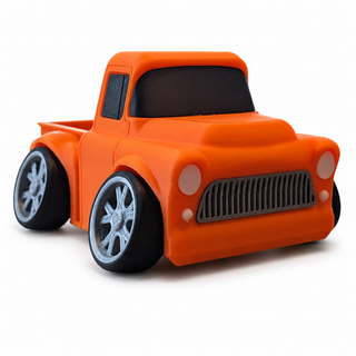 Orange Classic Pickup Tooned 3D Printed Desk Model shown from the front three-quarter angle on a white background.