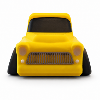 Elevated top view of a yellow Classic Pickup Tooned 3D Printed Desk Model on a white background.