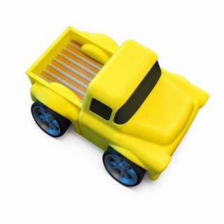 Elevated top view of a yellow Classic Pickup Tooned 3D Printed Desk Model on a white background.