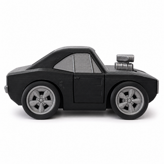 Side profile of a Supercharged Dodge Charger tooned 3D printed desk model on a white background.