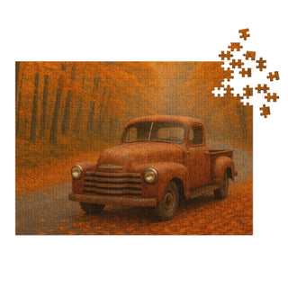 500-piece puzzle featuring a weathered pickup resting on a leaf-covered road in golden fall light.