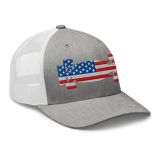 Front-right view of a heather gray and white snapback trucker cap embroidered with a USA flag formula racing car